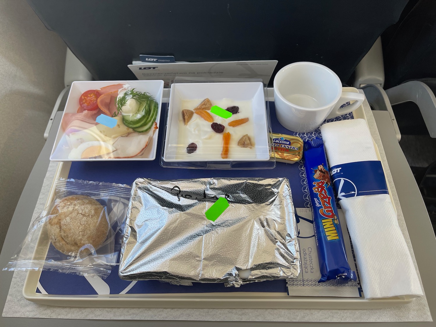 a tray of food on a plane