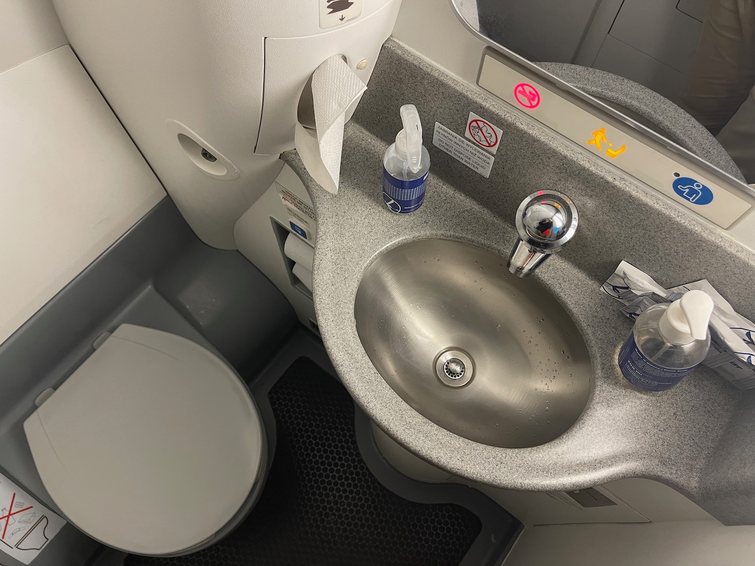a sink and toilet in a plane