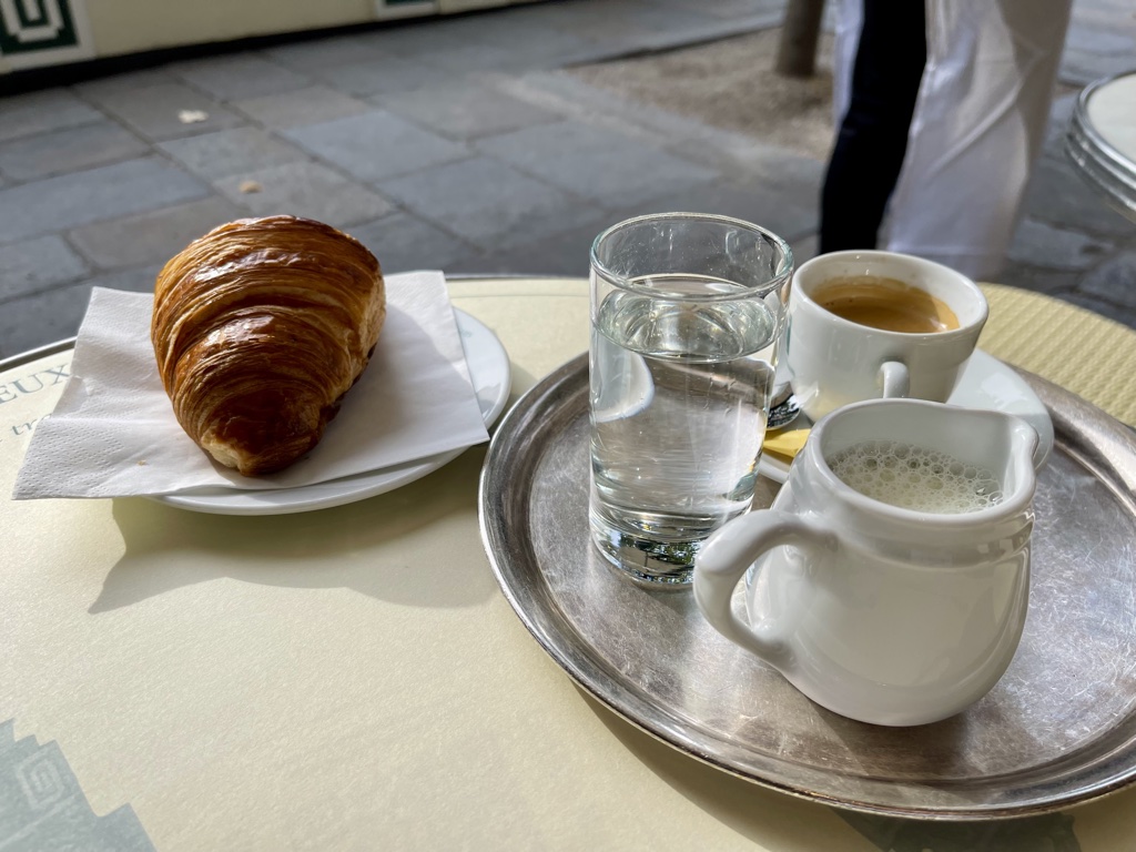 Les Deux Magots coissant espresso milk water