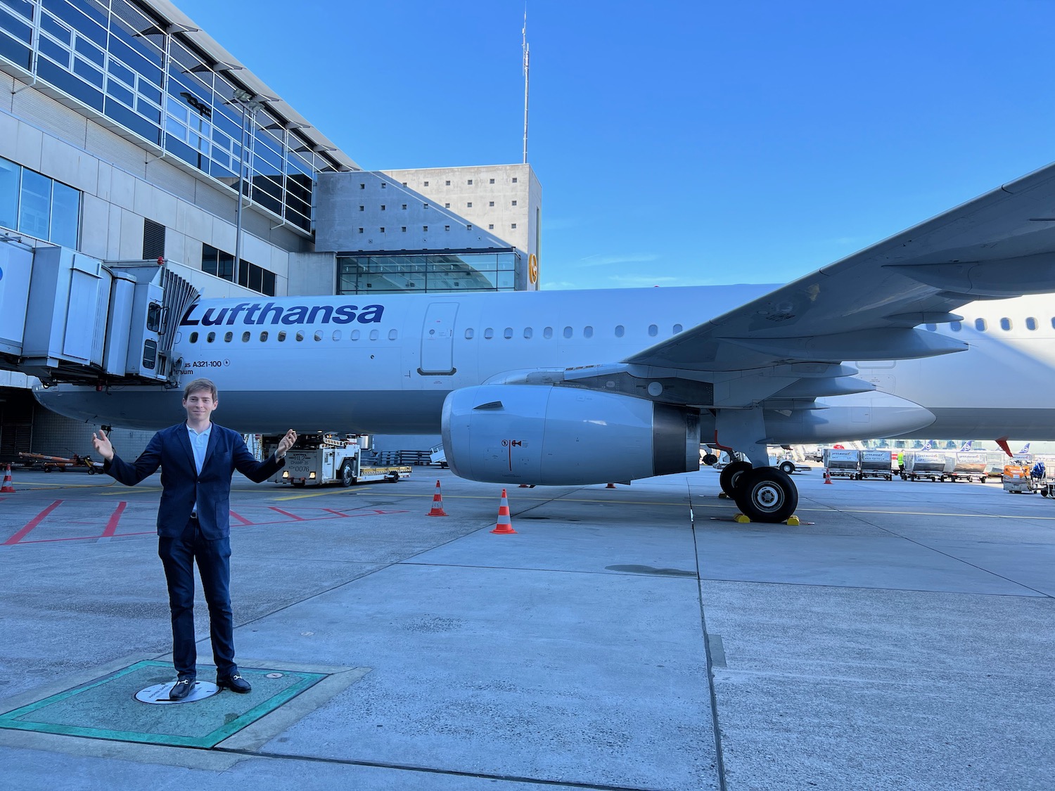 a man standing in front of an airplane