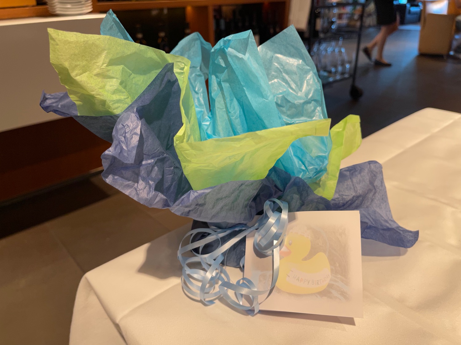 a blue and green wrapped gift