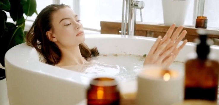 a woman in a bathtub