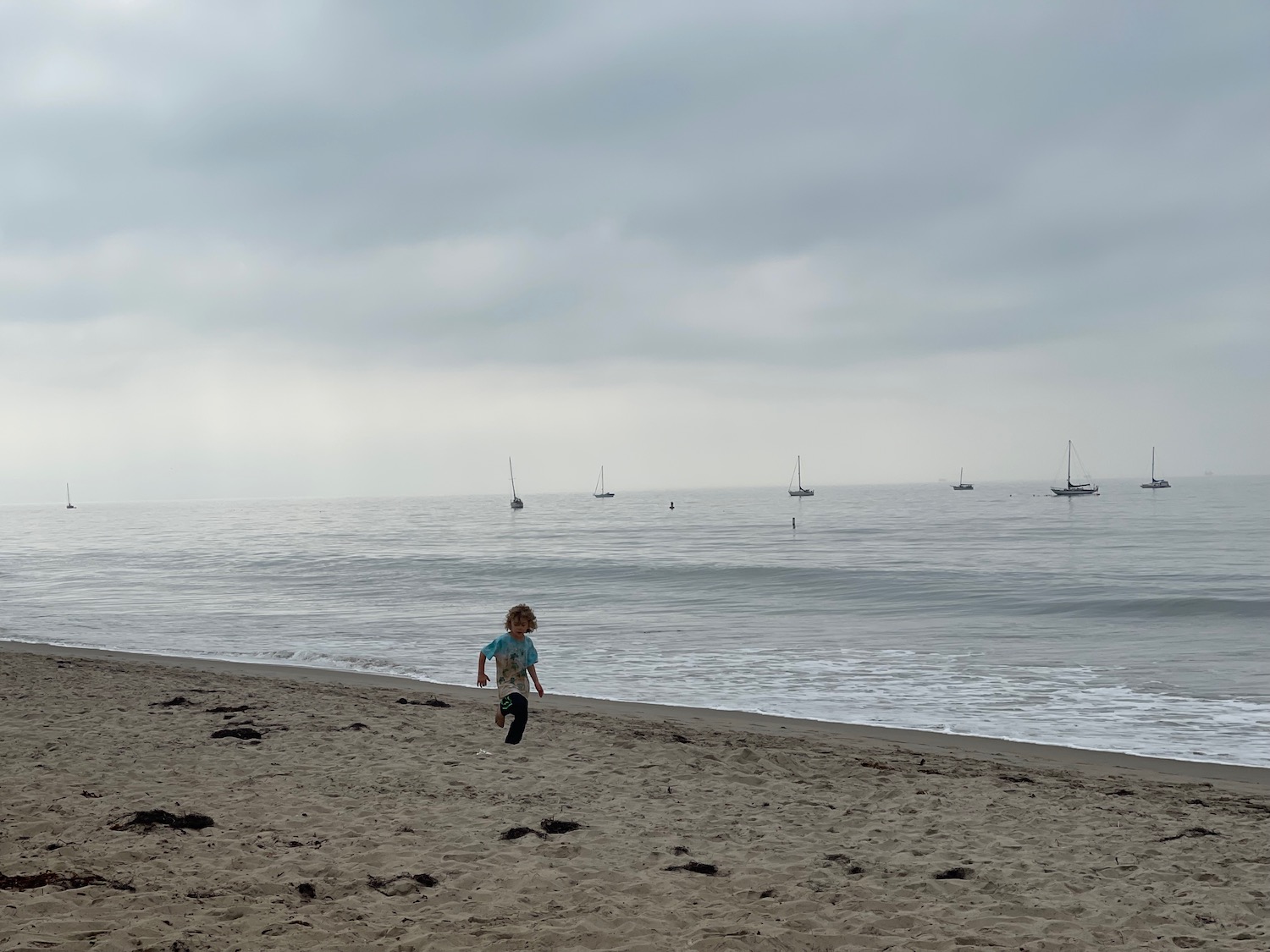 a child running on a beach