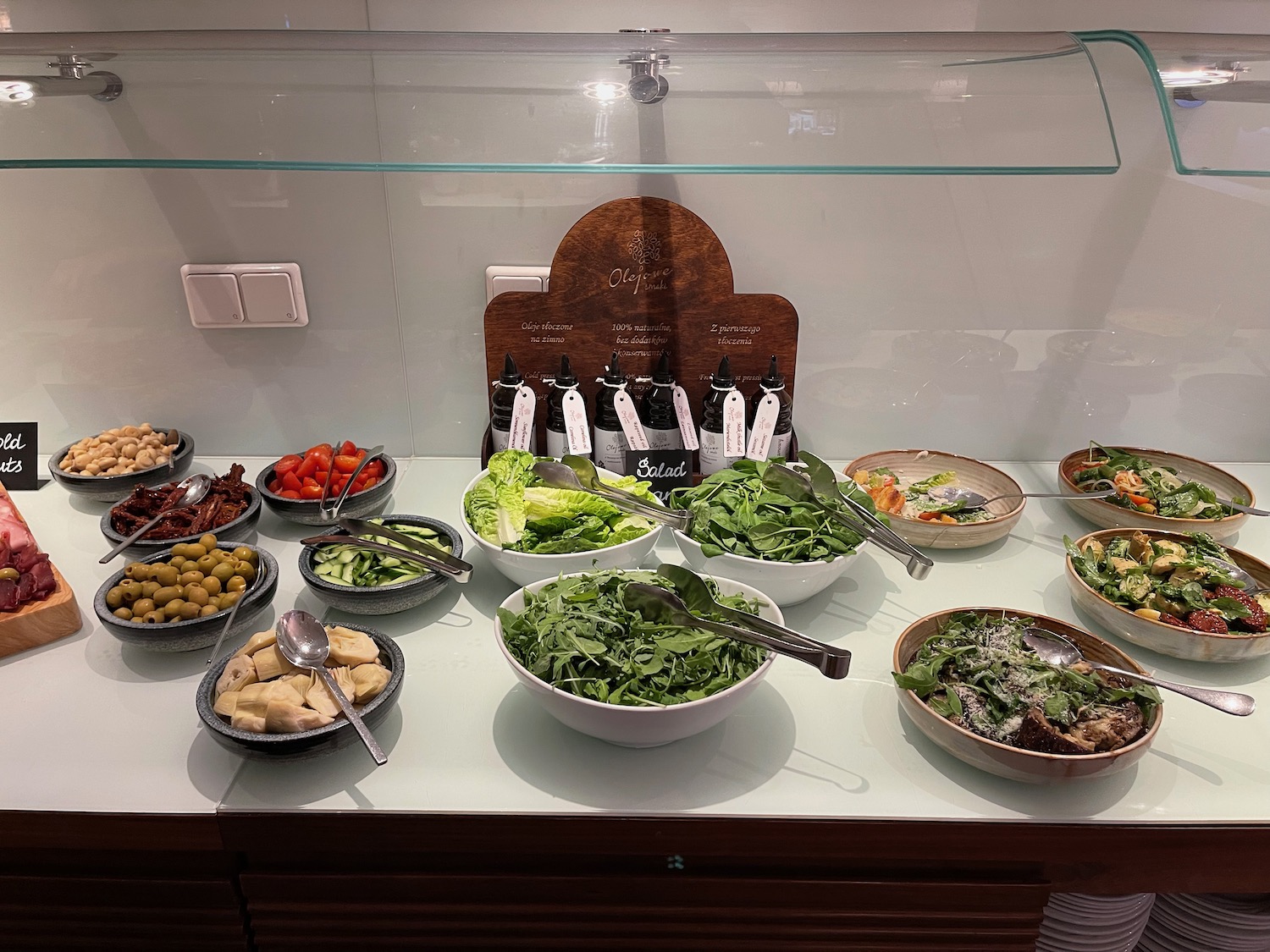 a salad bar with different types of food