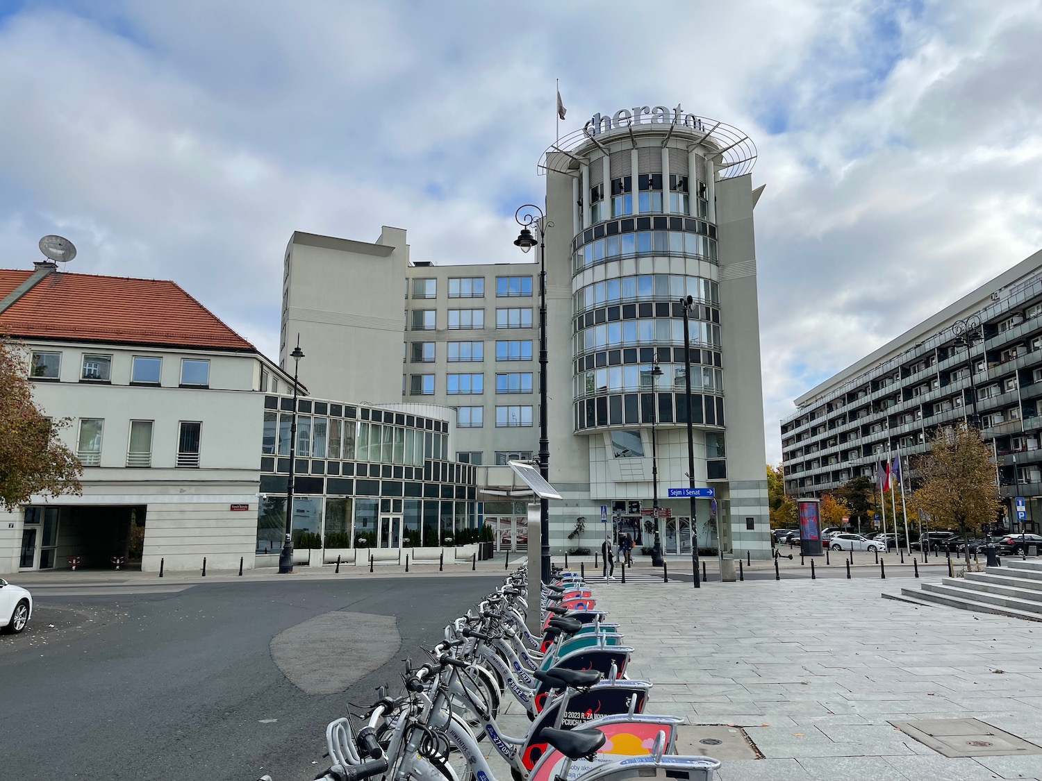 a group of bicycles parked in front of a building