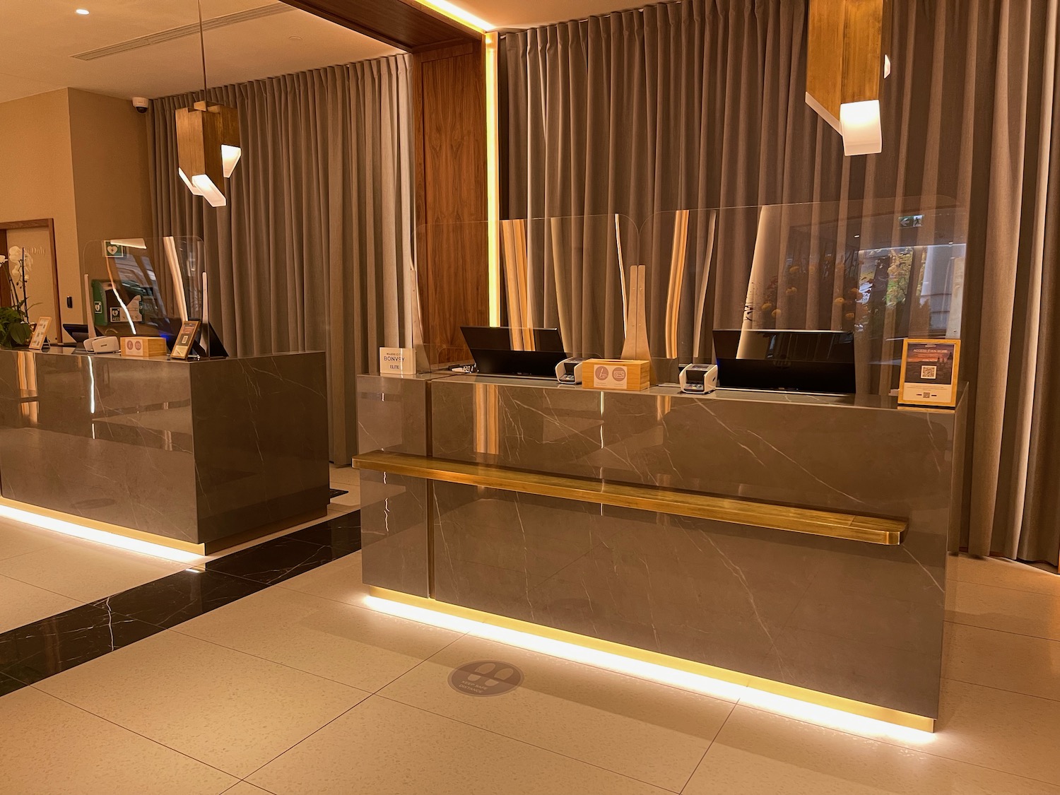 a reception desk in a hotel