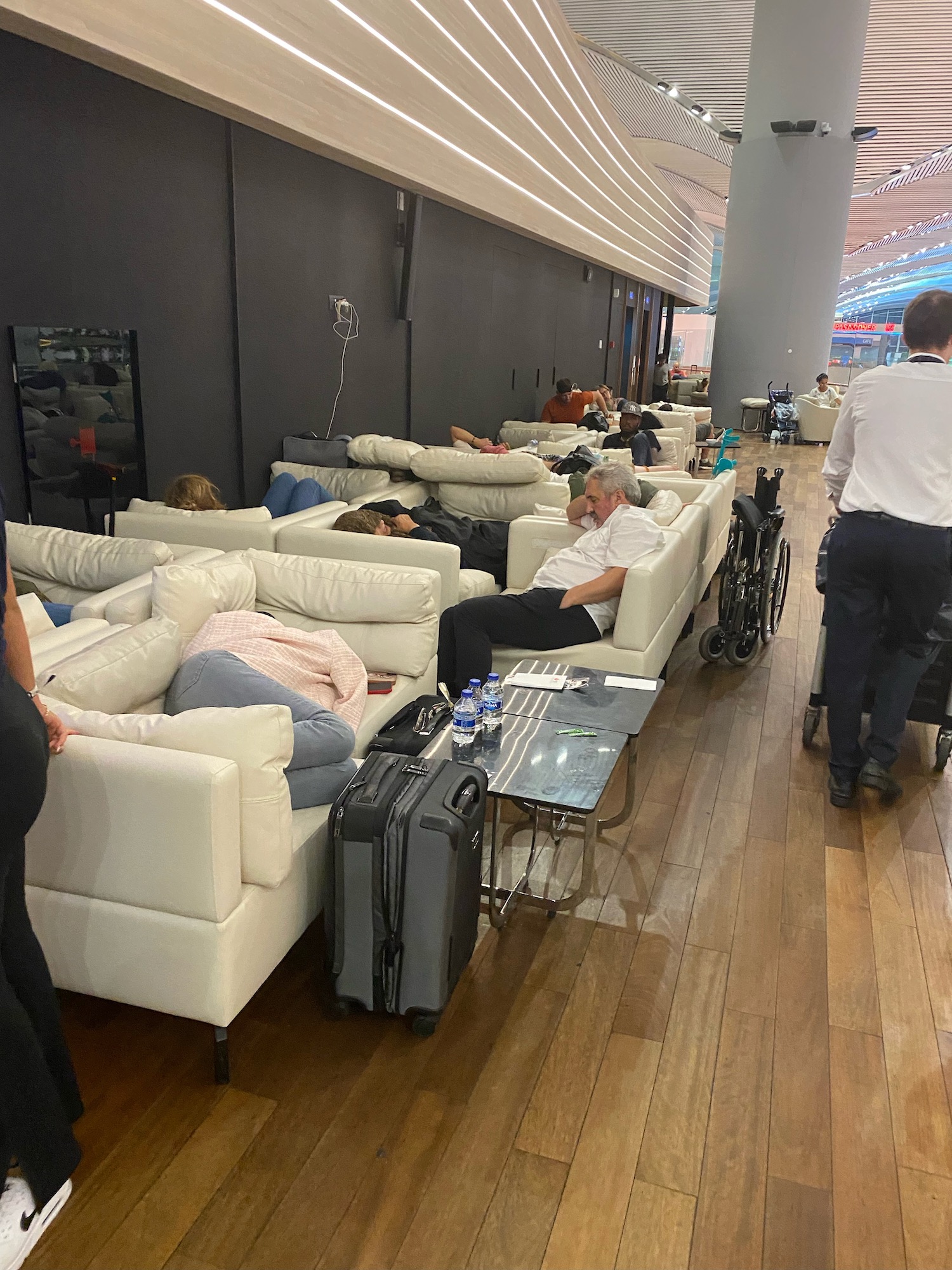 people sitting on couches in a room