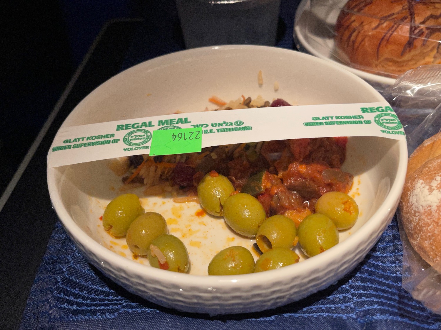 a bowl of food with a sticker above it