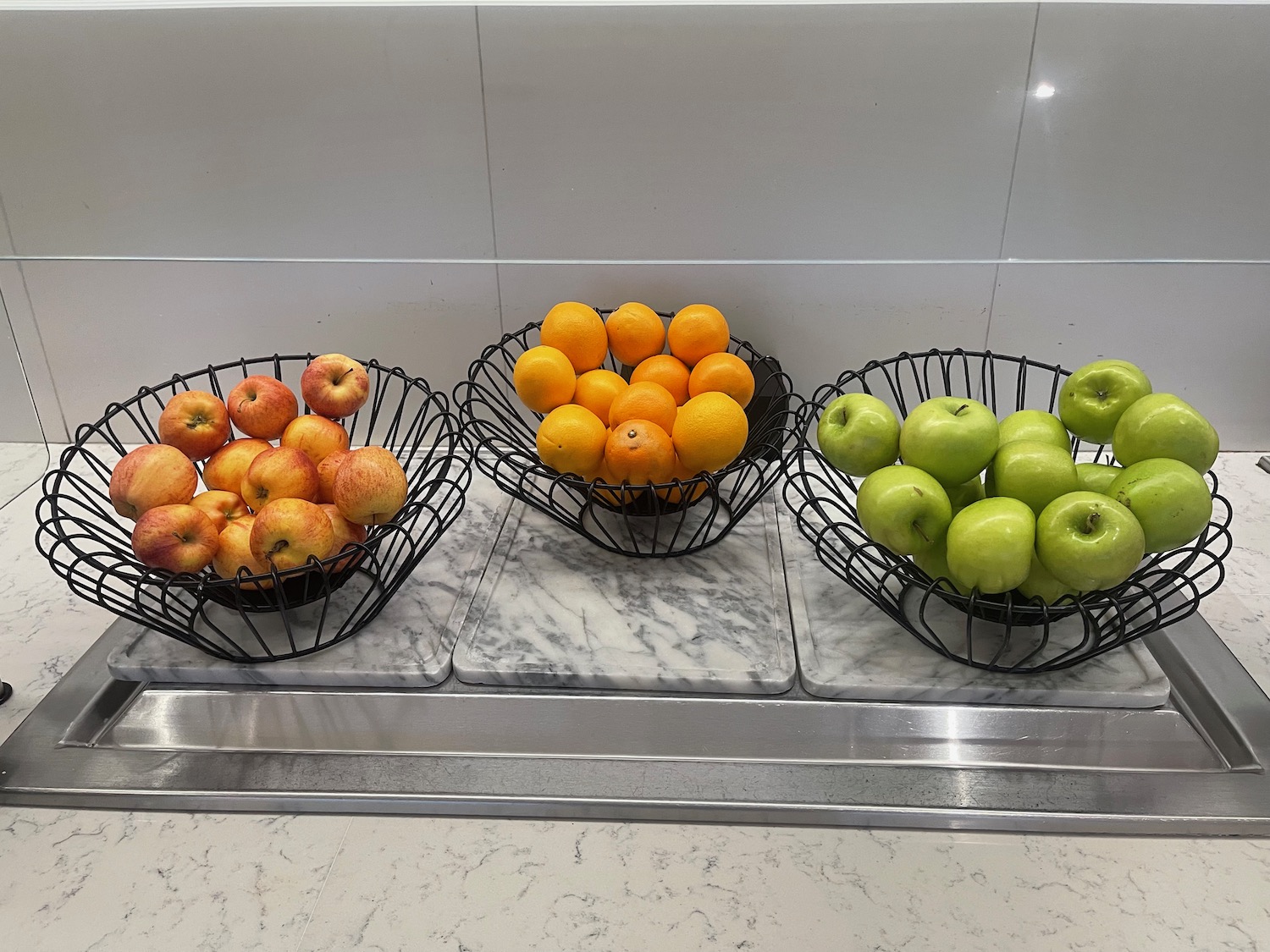 a group of fruit in baskets