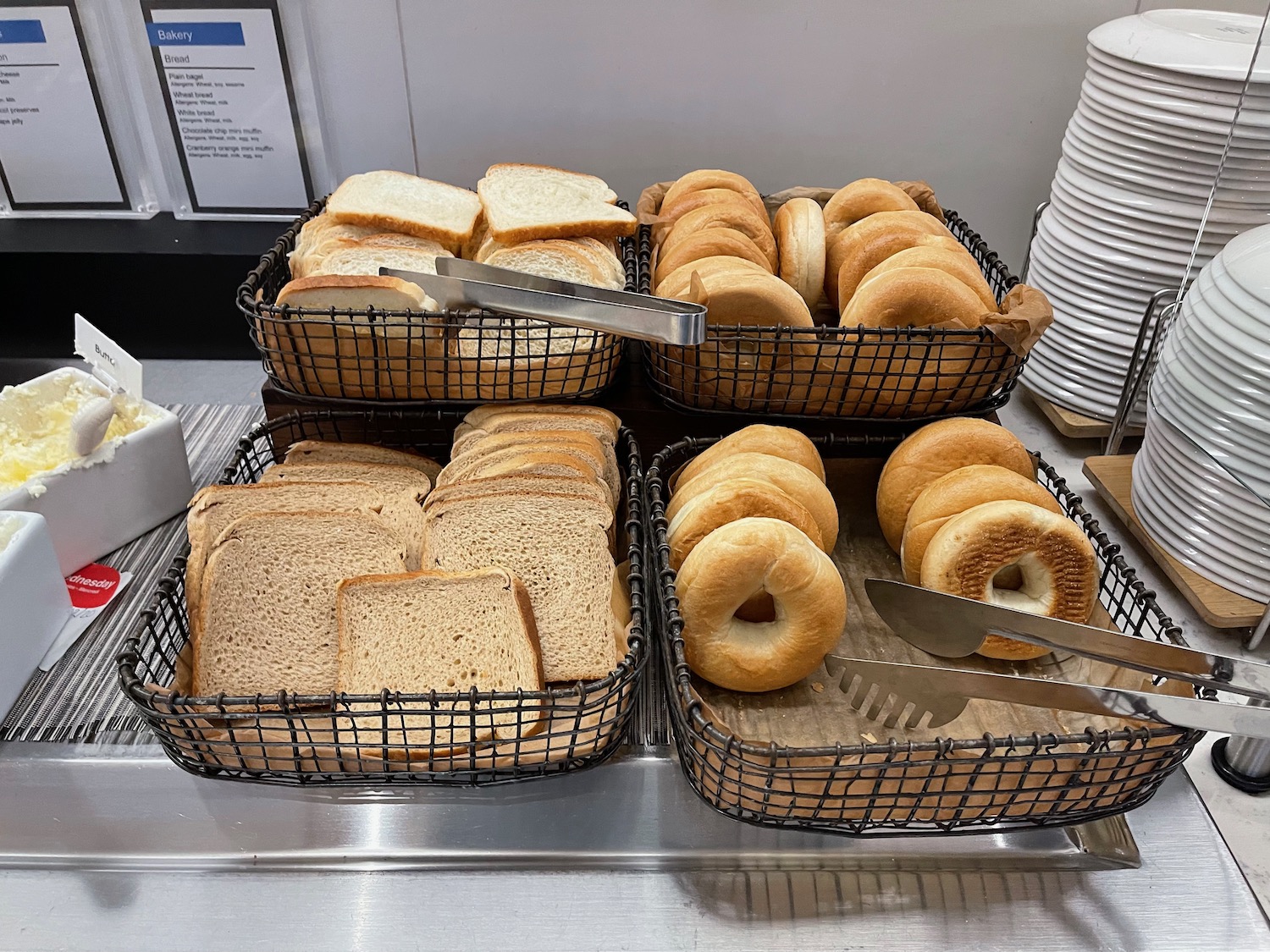 a tray of bread and bagels