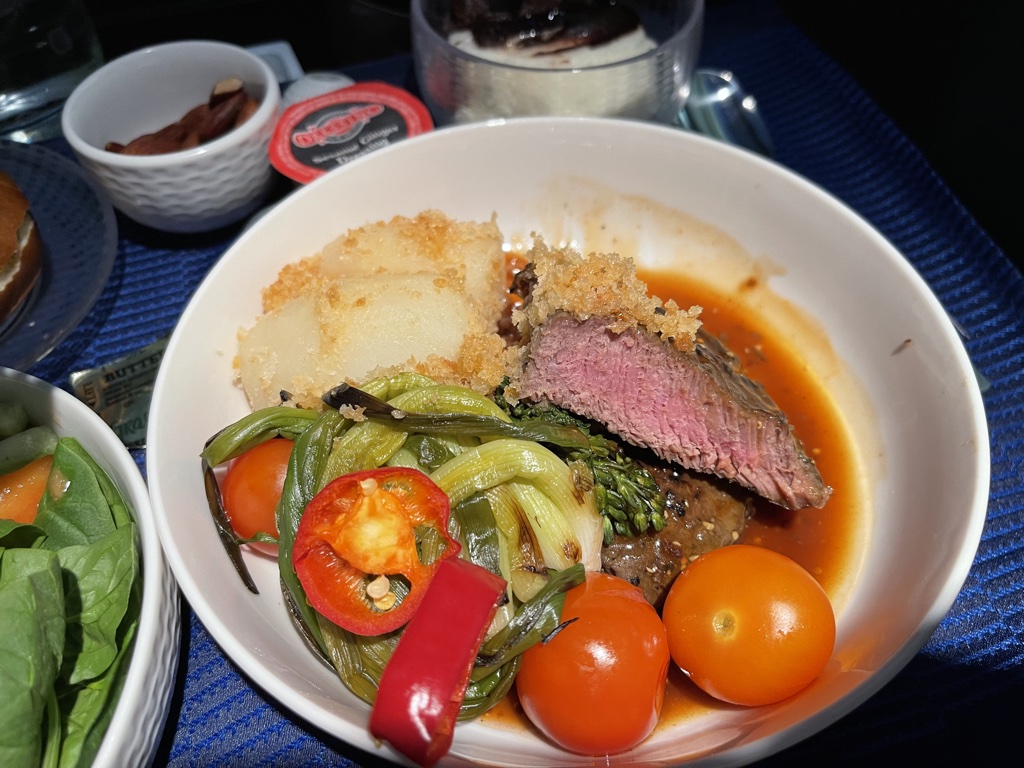 United Polaris Washington Dulles Paris flat iron steak medium