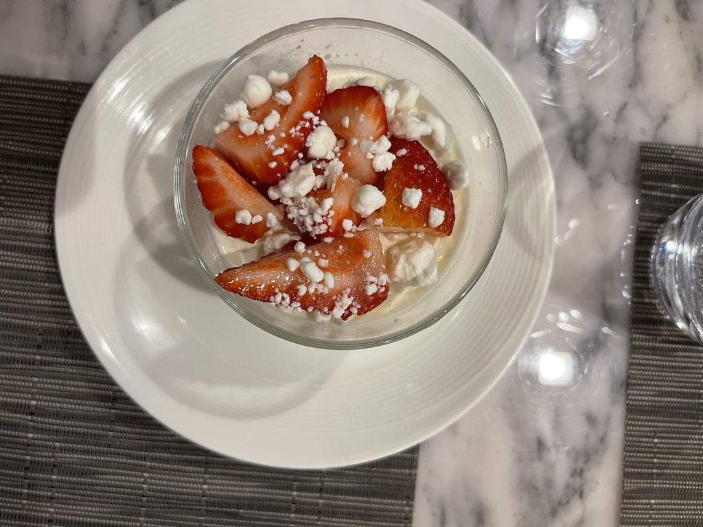 United Polaris dining goat cheese and strawberry panna cotta