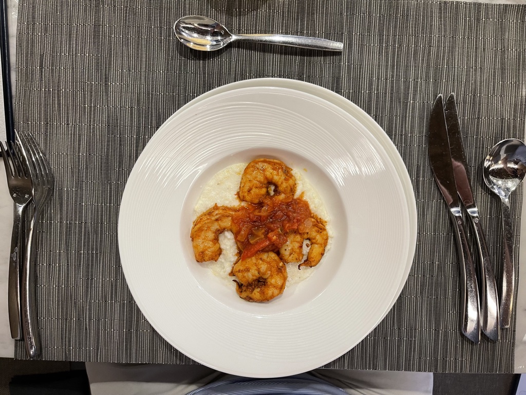 United Polaris dining shrimp and grits