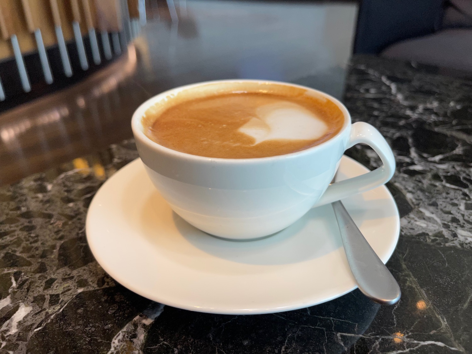 a cup of coffee on a saucer