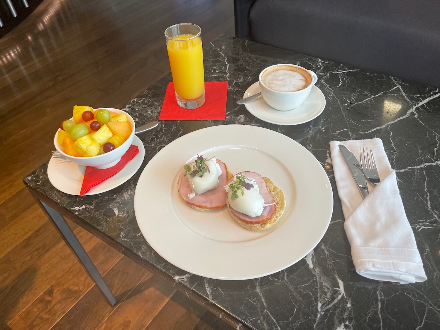 a plate of food and a drink on a table