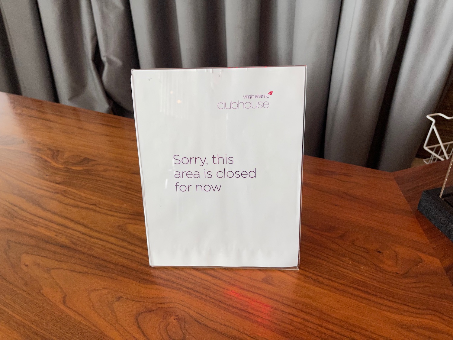 a white sign on a table