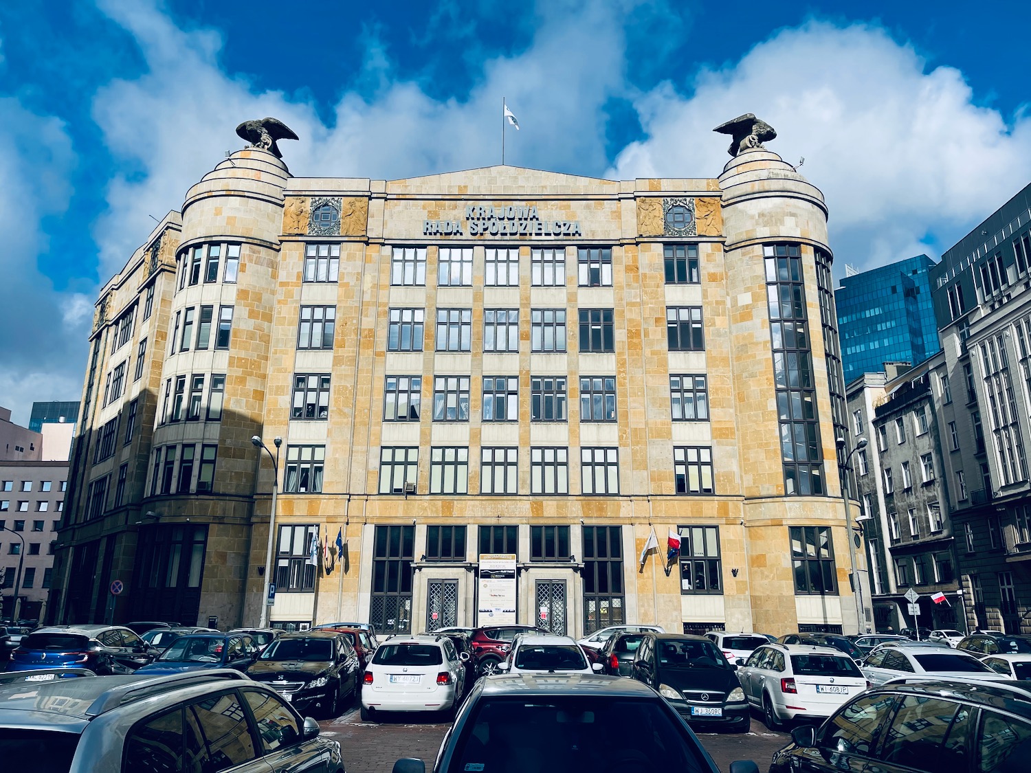 a building with cars parked in front of it