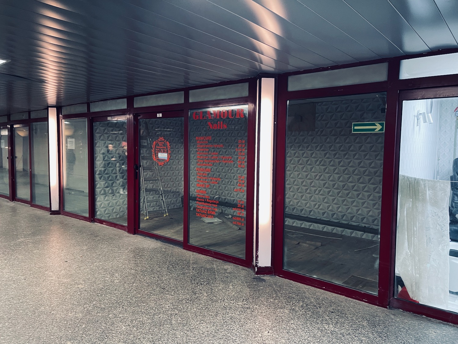 a glass doors with red frames