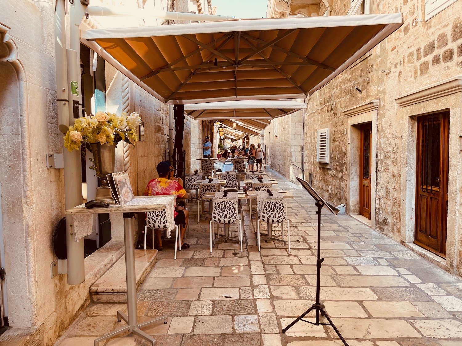 a street with tables and chairs