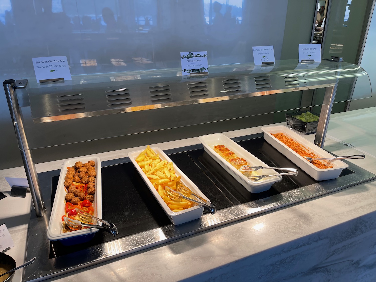 food in containers on a counter