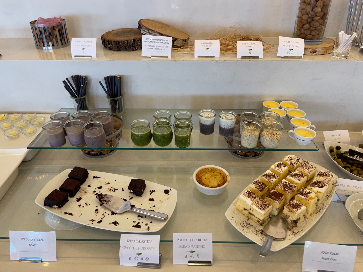 a display of desserts on a shelf