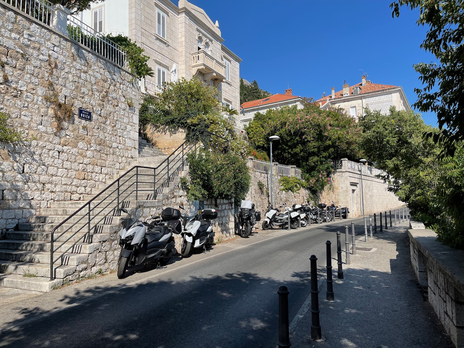 a group of motorcycles parked on a street