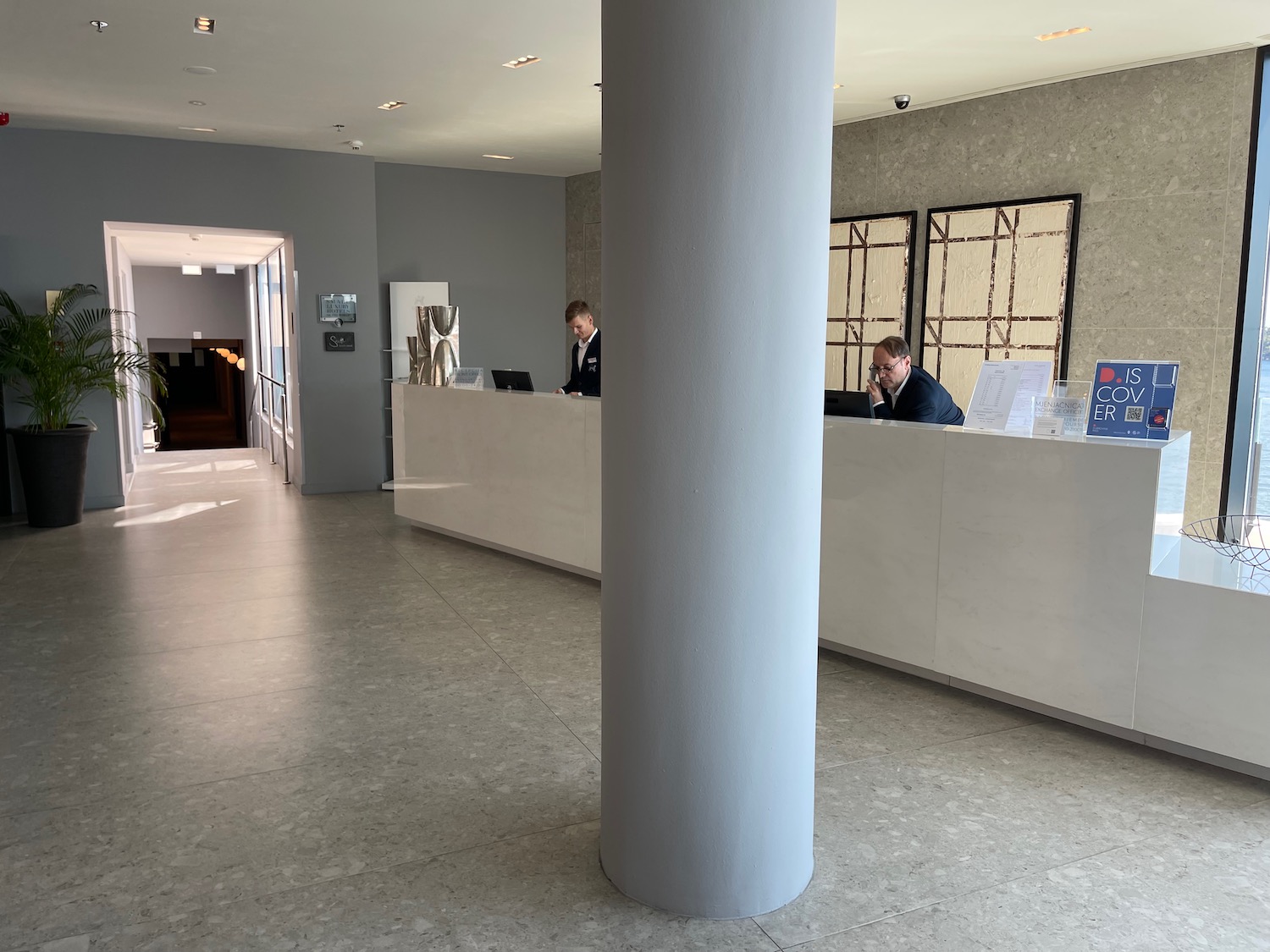 a man at a reception desk