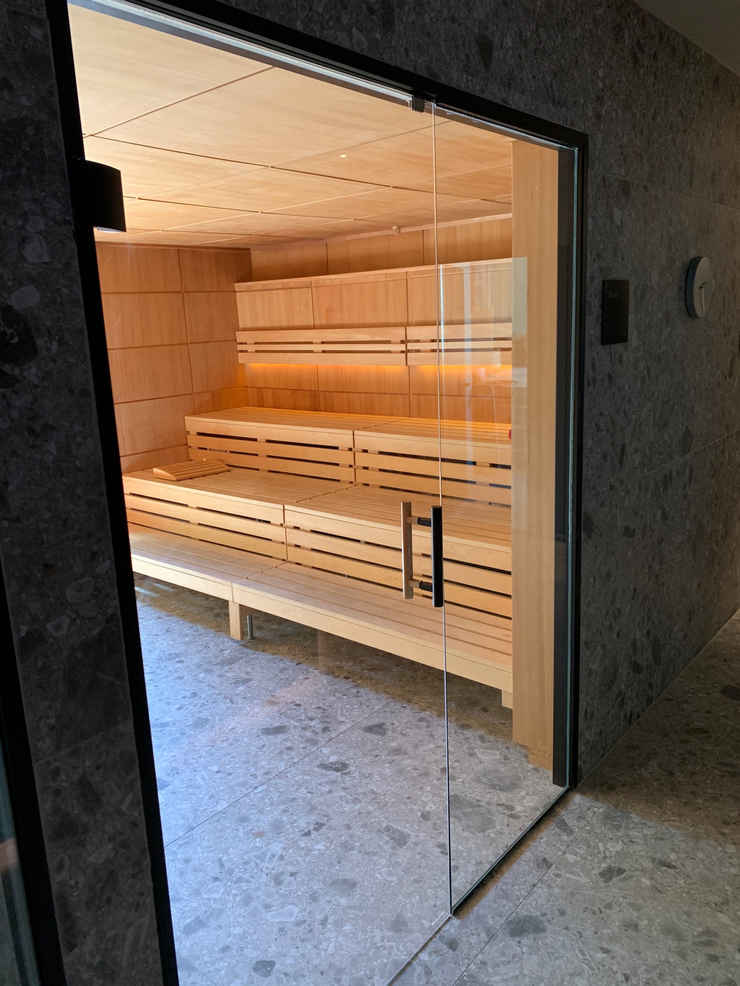 a glass door to a sauna