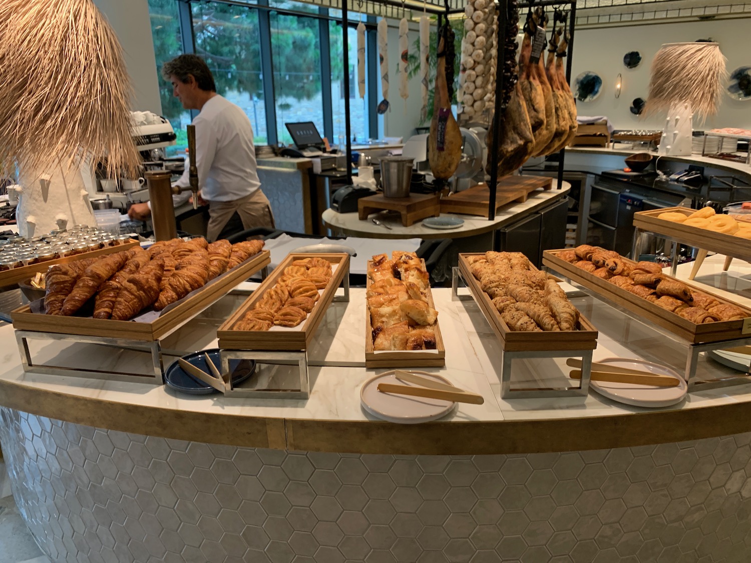 a counter with different types of pastries