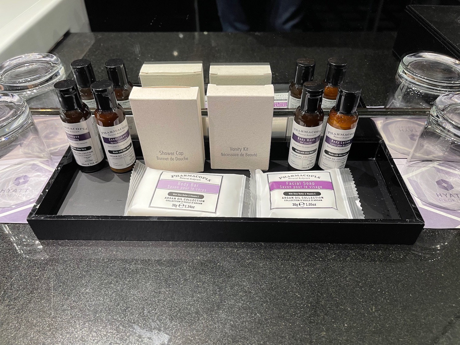 a group of small bottles and packages of essential oils