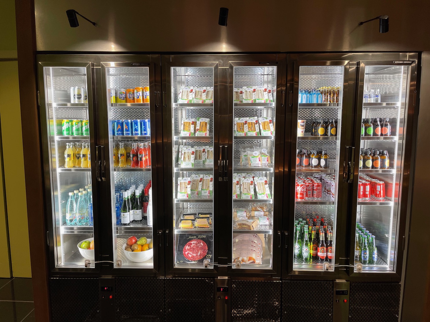 a refrigerator with drinks and beverages