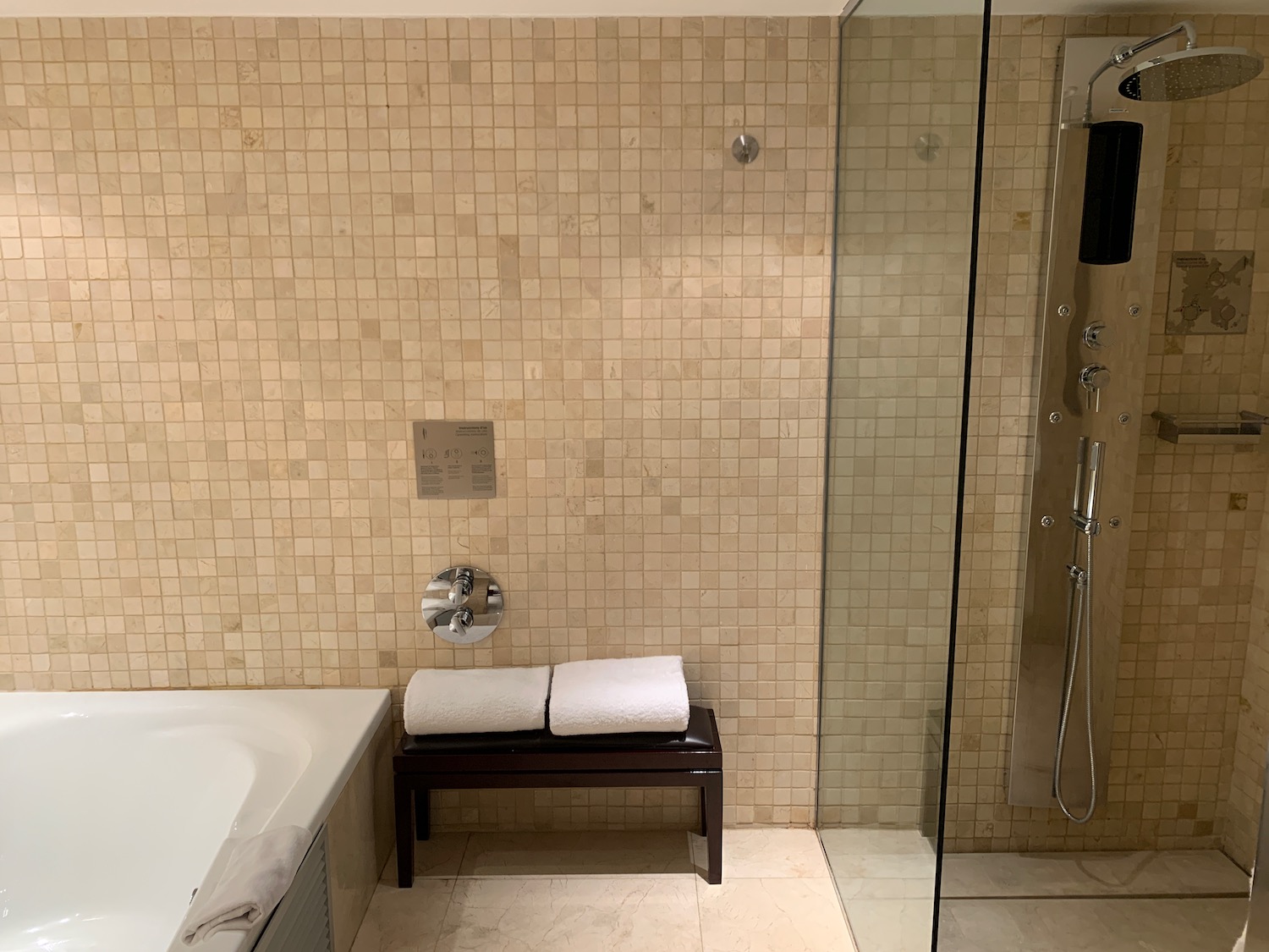 a bathroom with a shower and bathtub