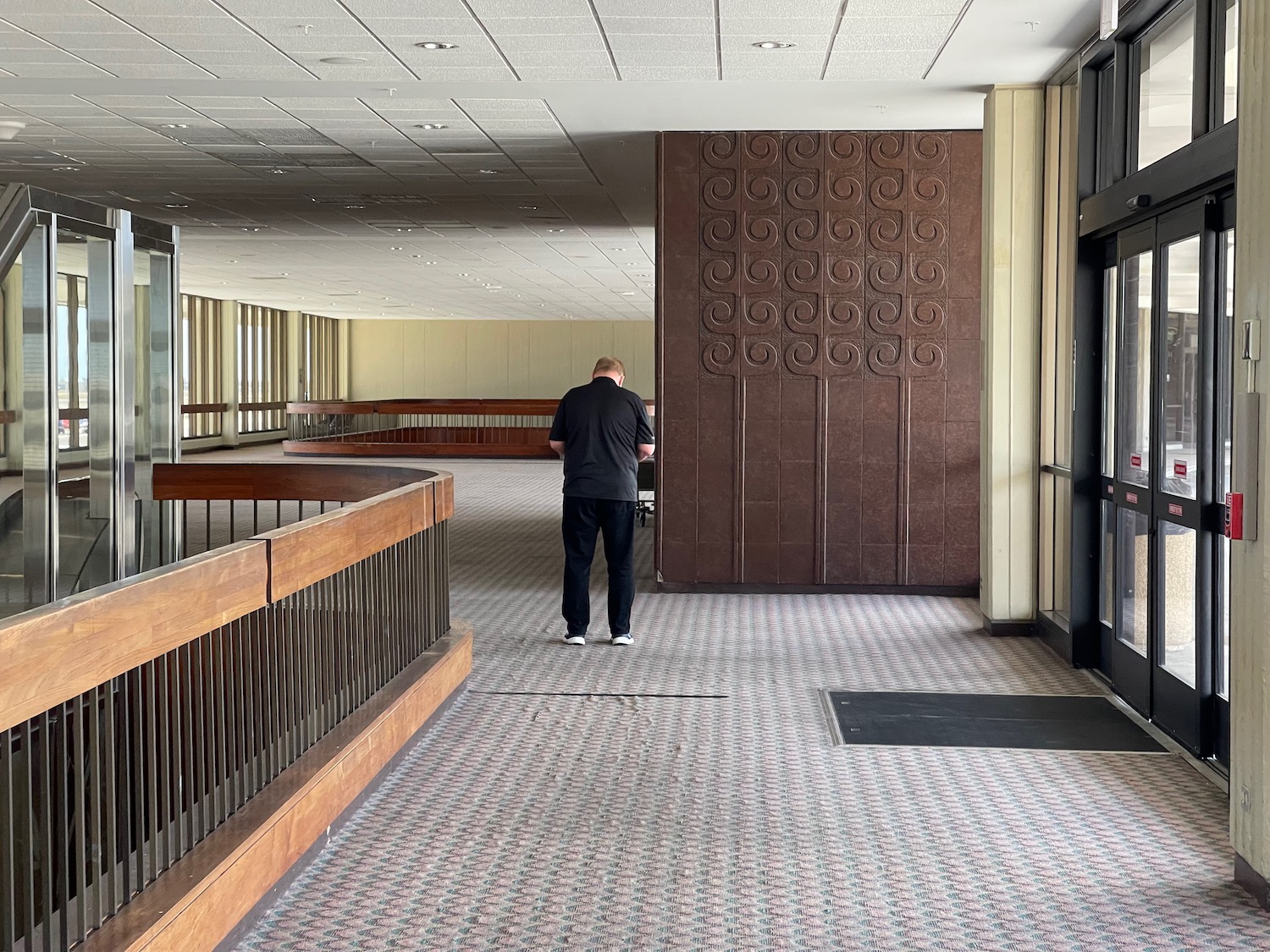 a man standing in a hallway