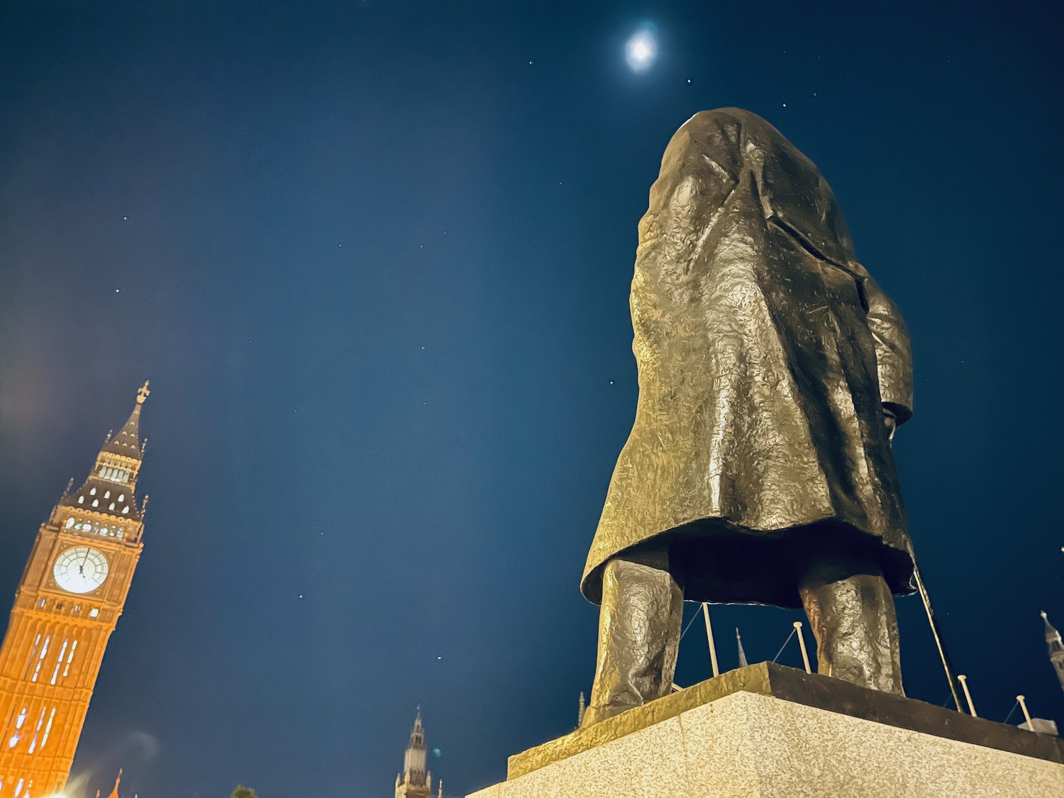 a statue of a man in a coat