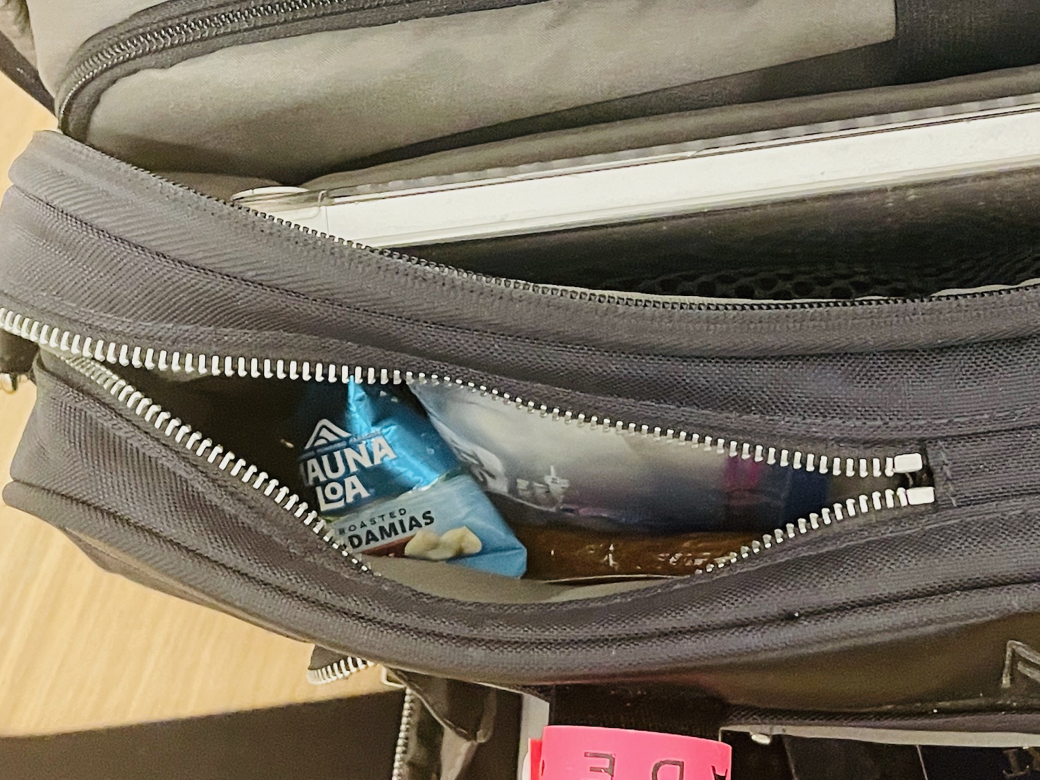 a bag with a zipper and a bag full of food