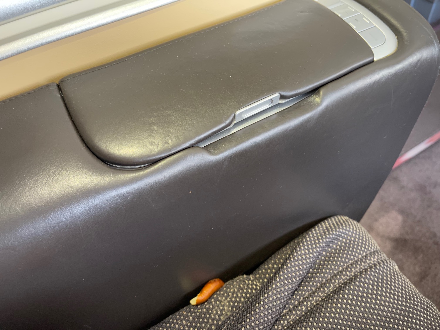 a arm rest on a seat