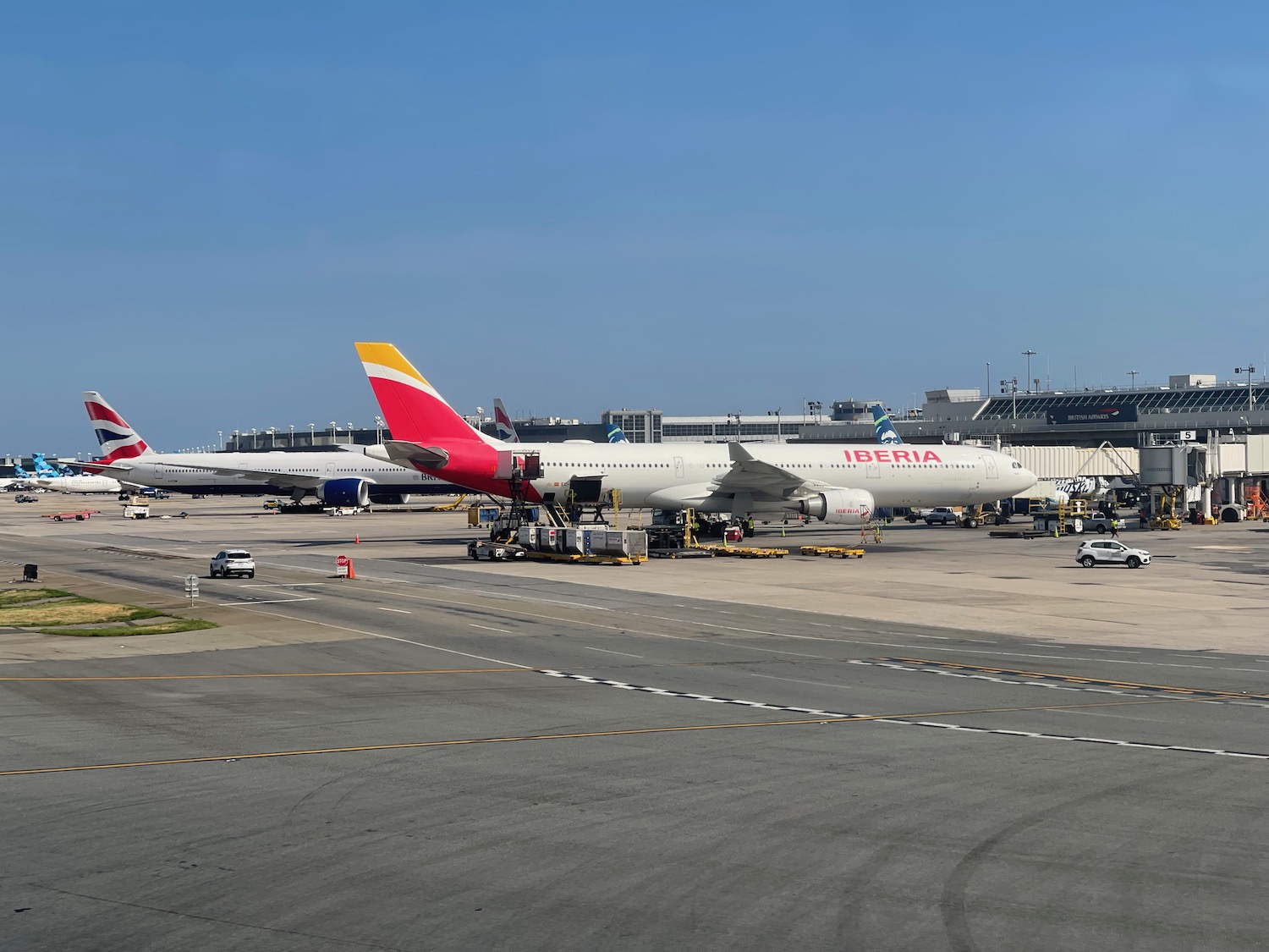 a group of airplanes at an airport