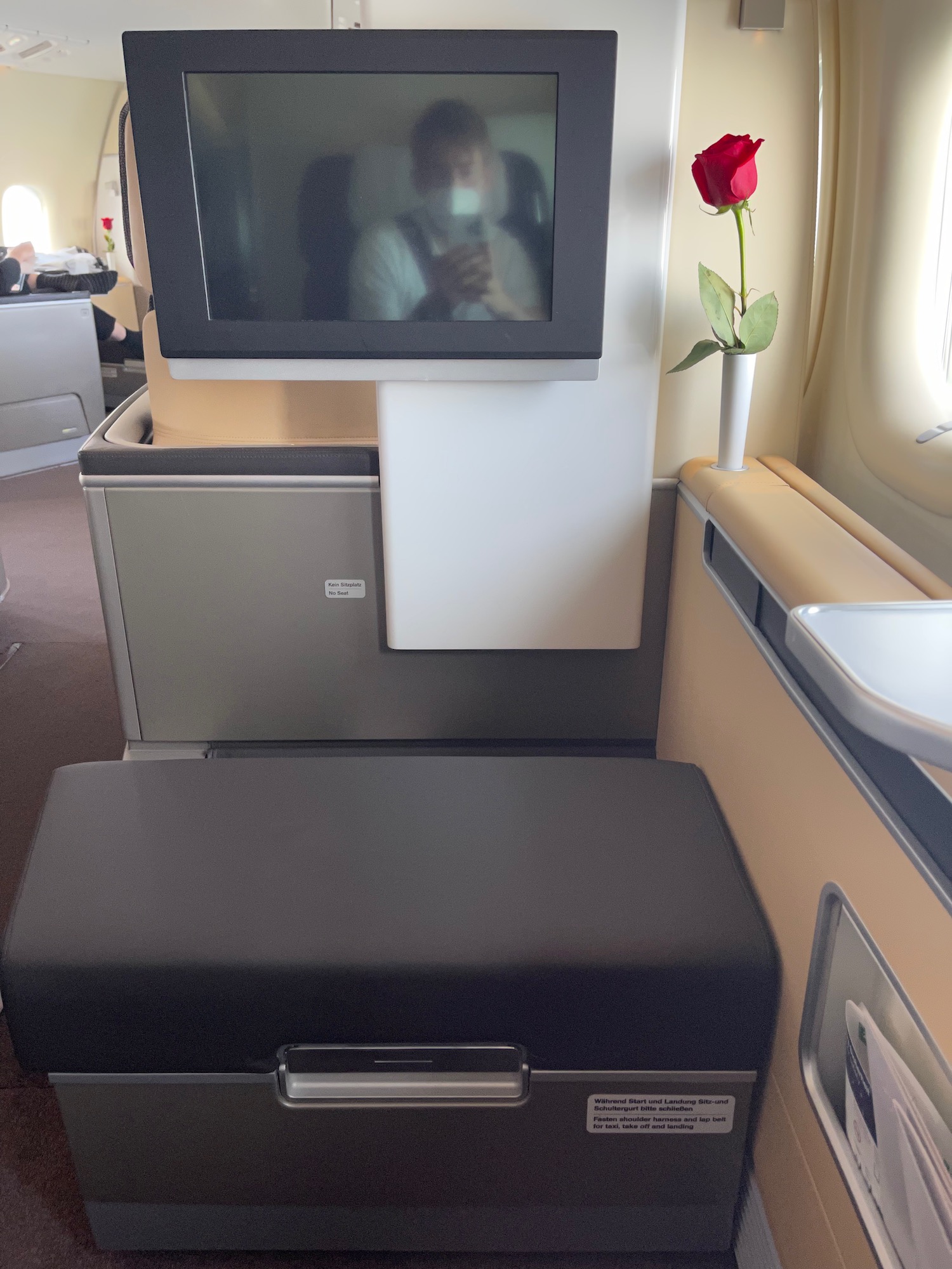 a tv on a seat in an airplane