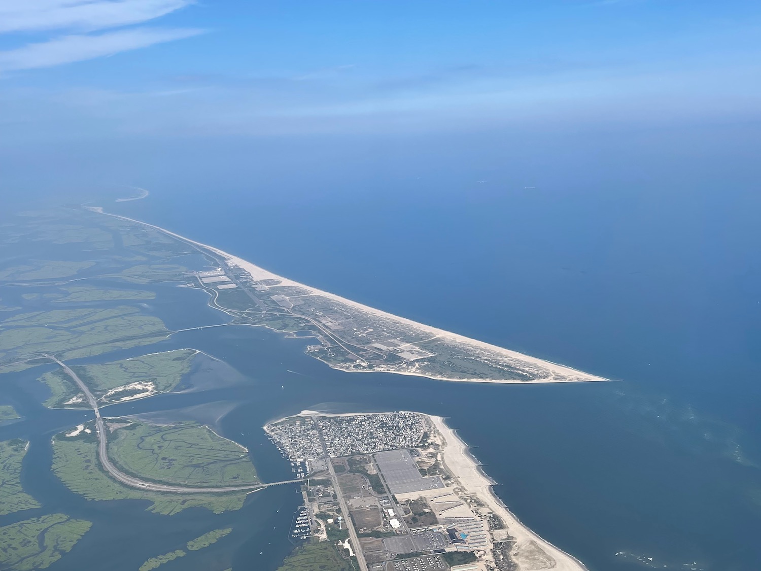 an aerial view of a body of water and land