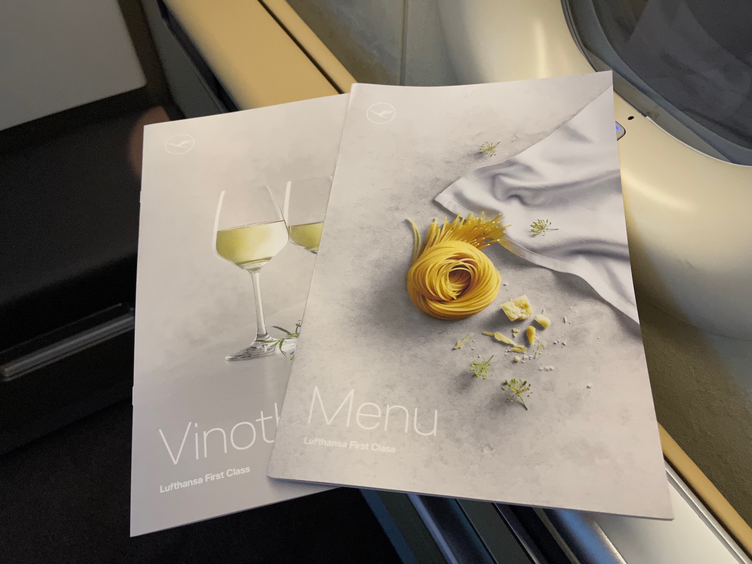 a couple of menus on a plane