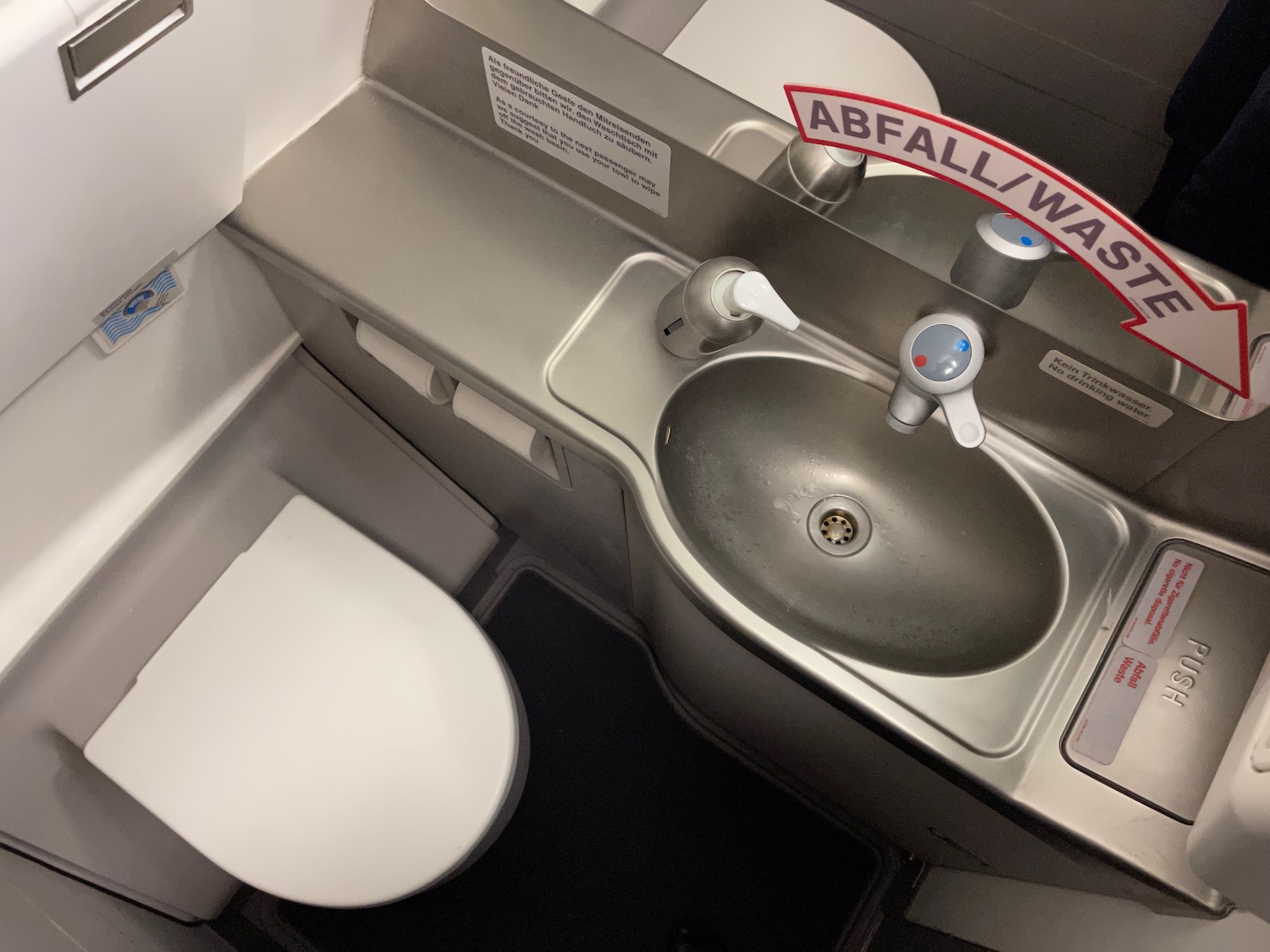 a sink and toilet in a plane