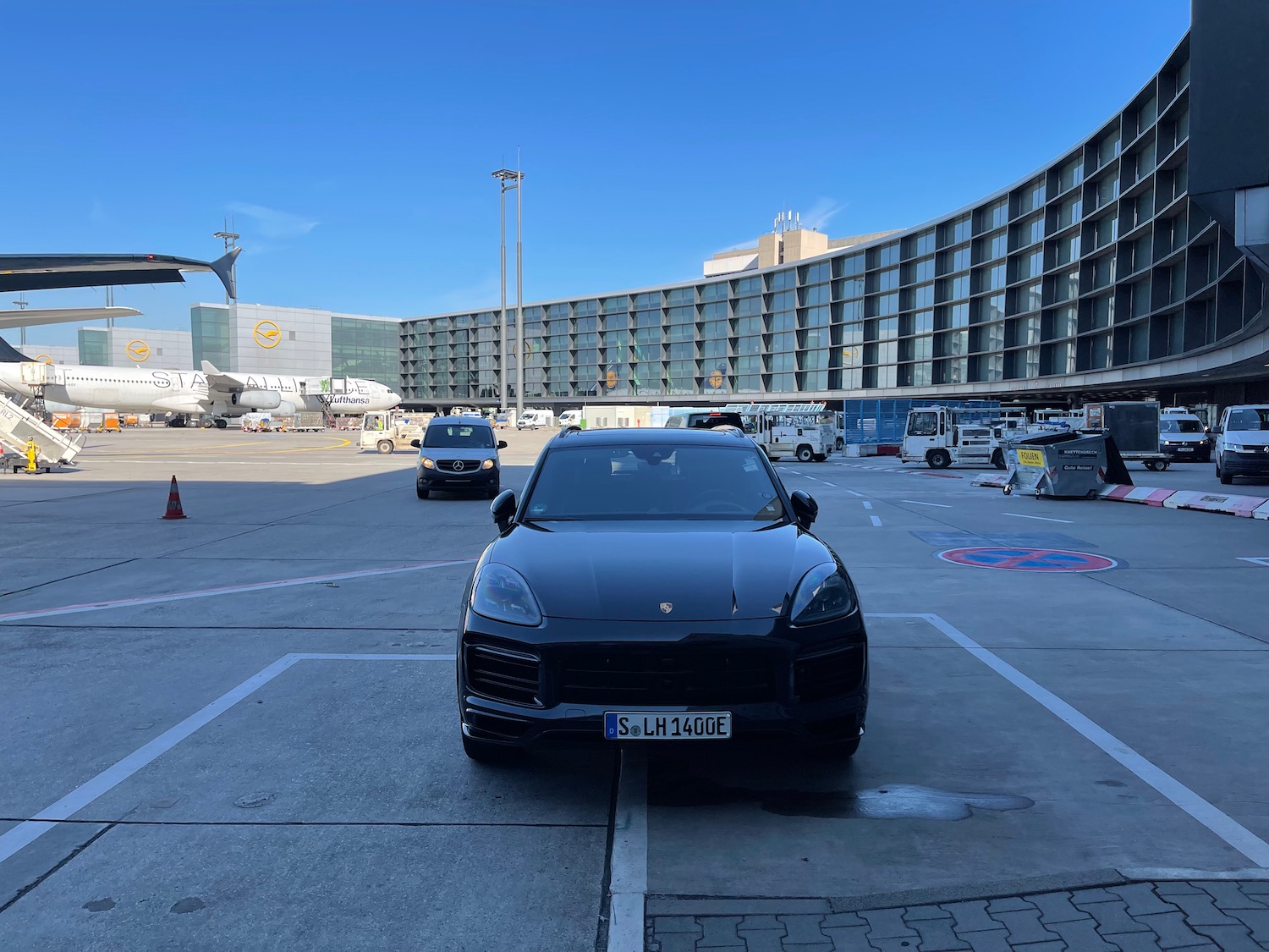 a black car parked in a parking lot