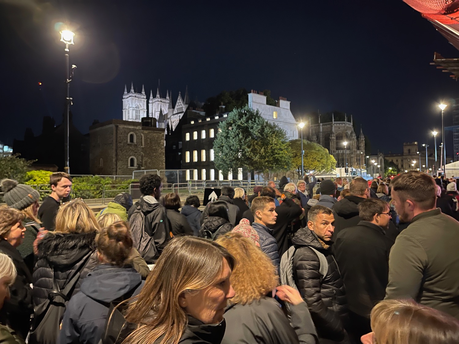 a group of people standing in a crowd