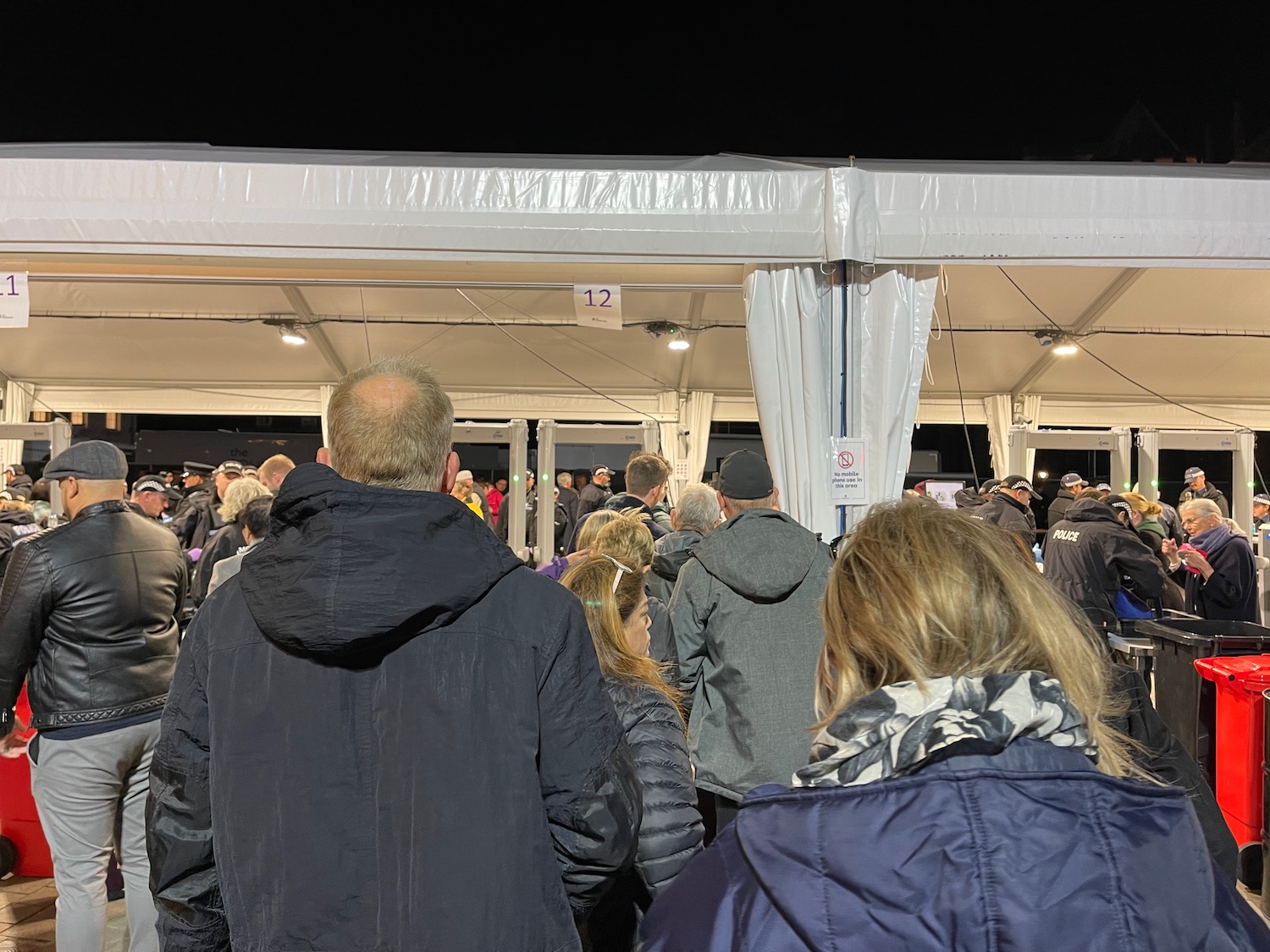 a group of people standing in a line