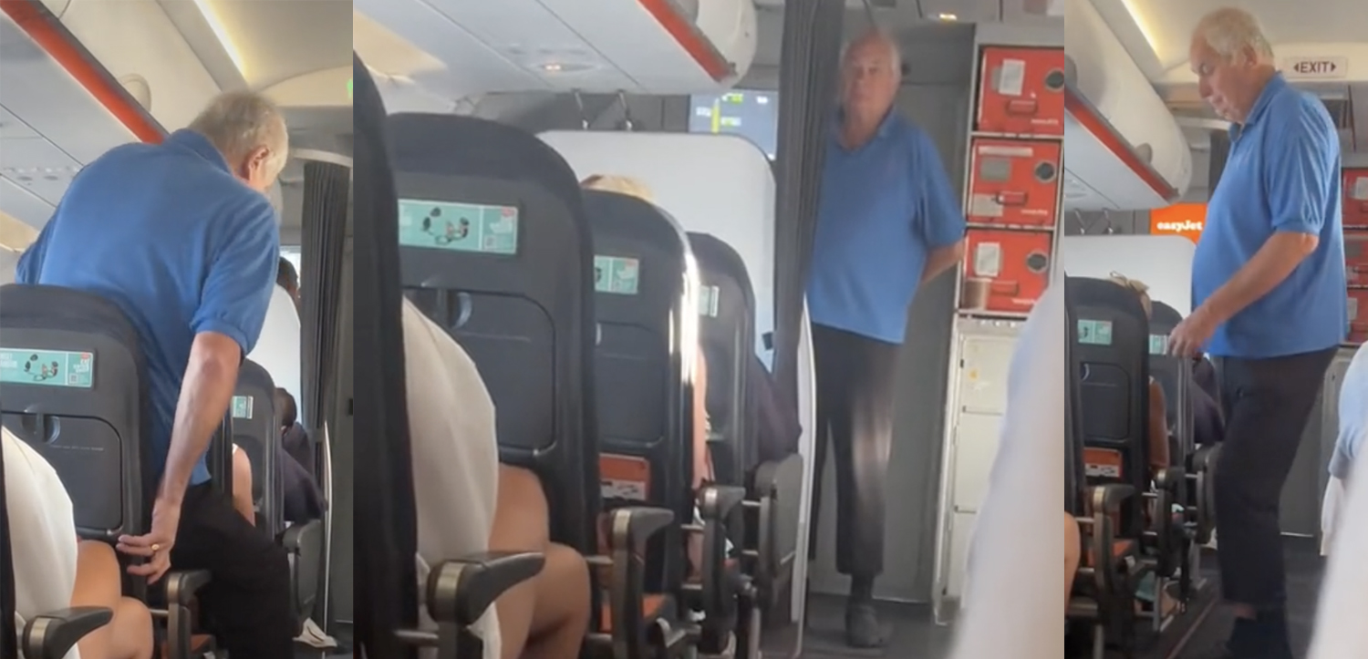 a man standing in an airplane