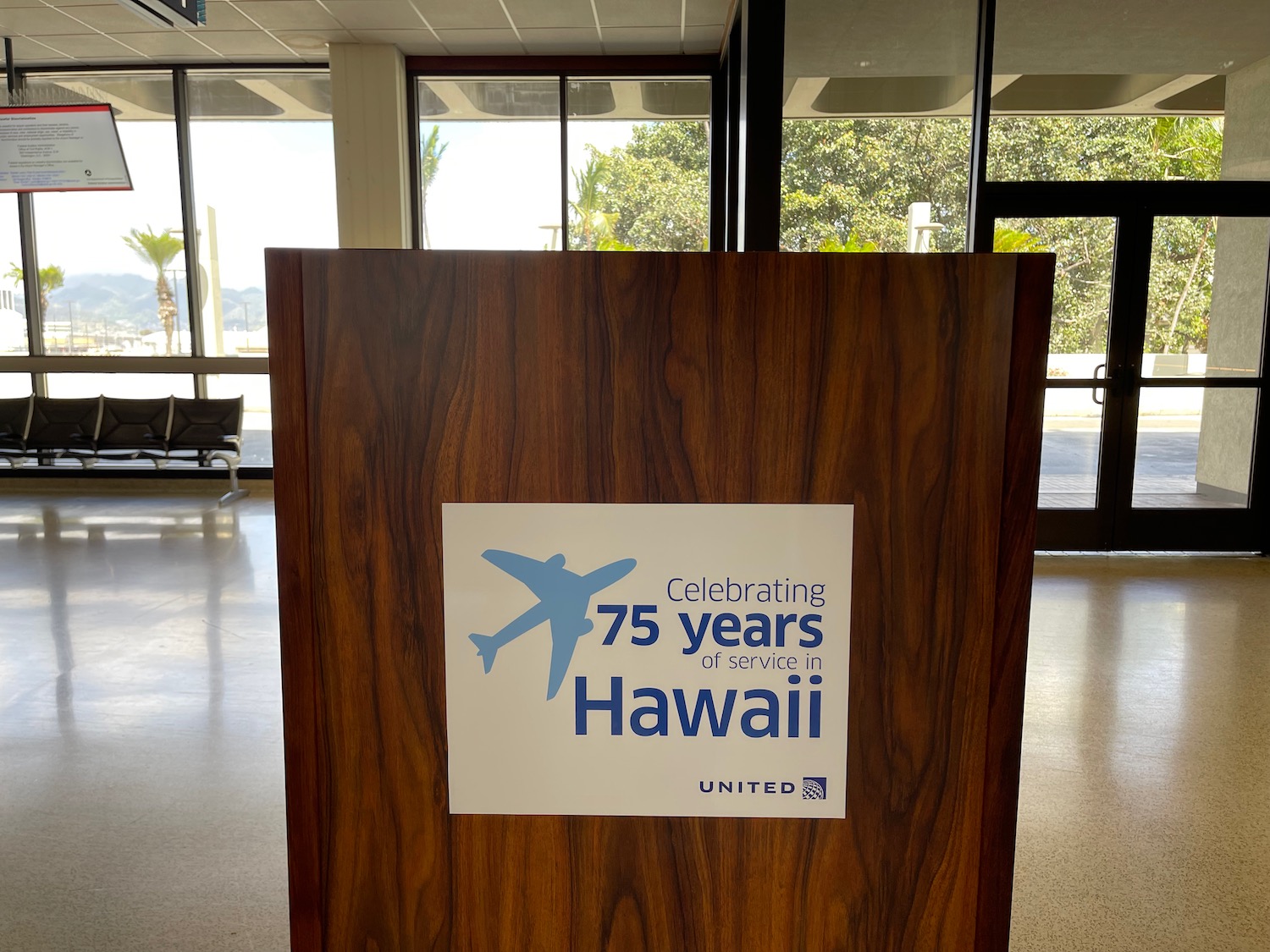 a wooden podium with a sign on it