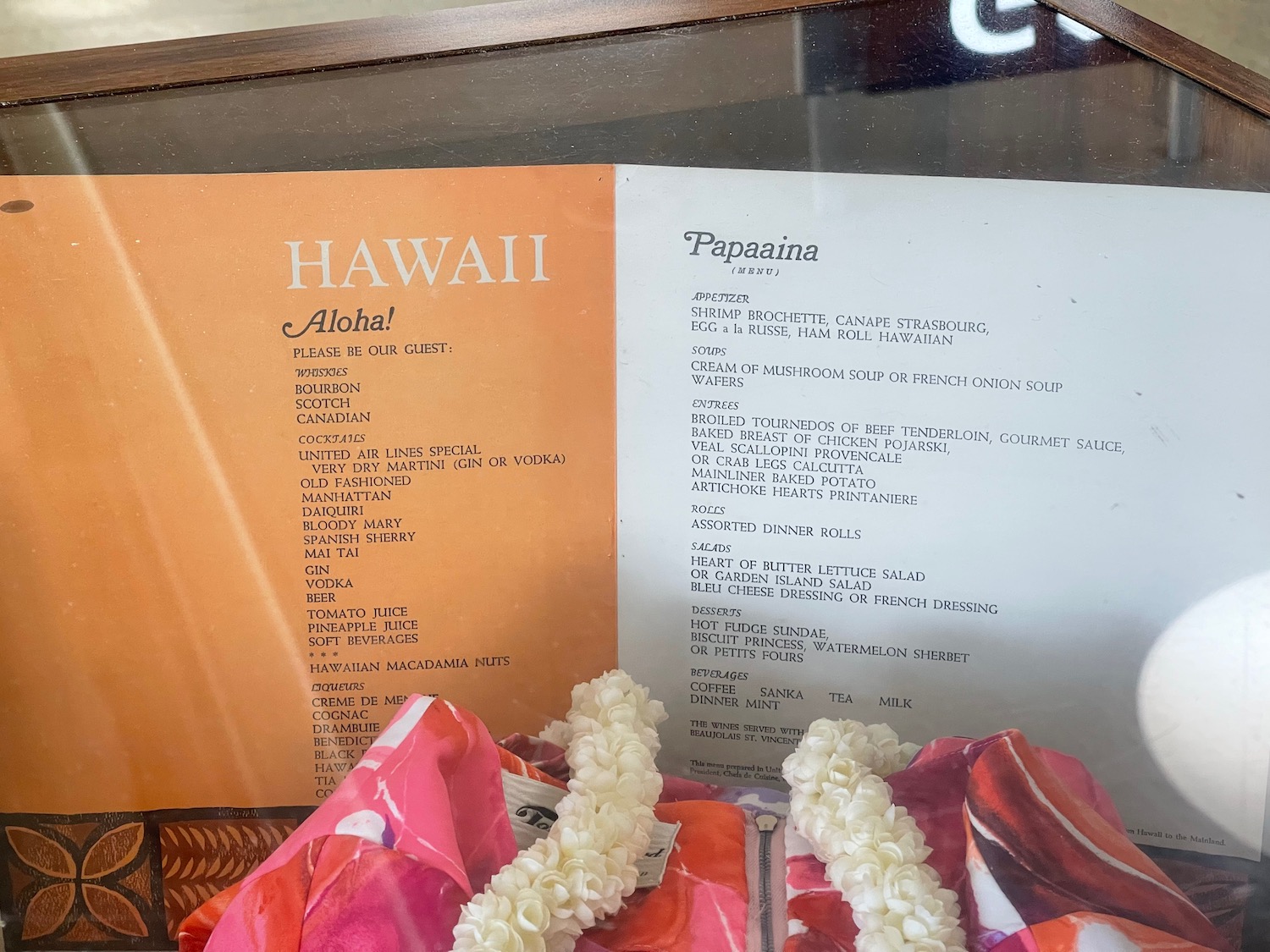 a menu with a lei on it