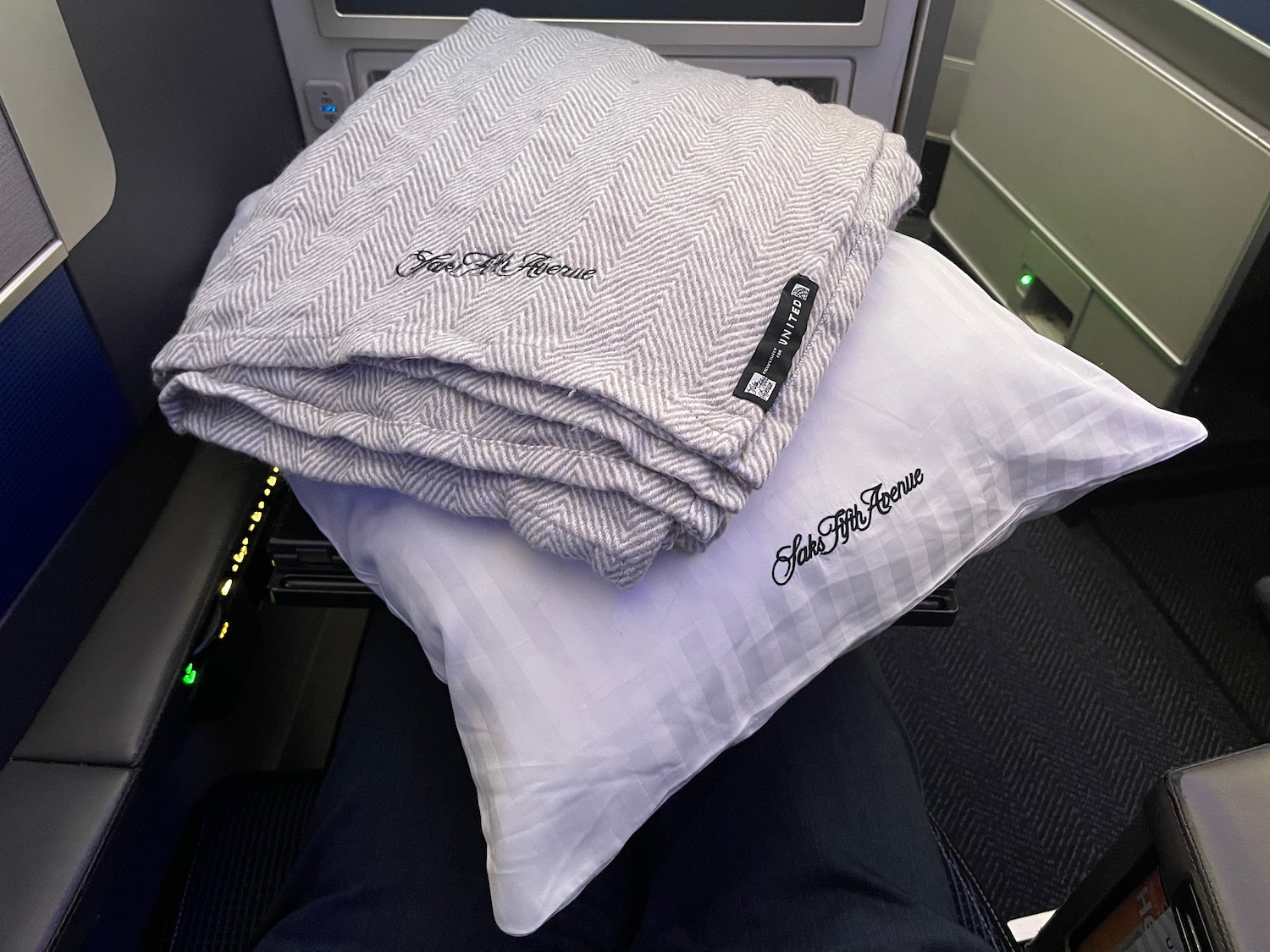 a blanket and pillow on a plane