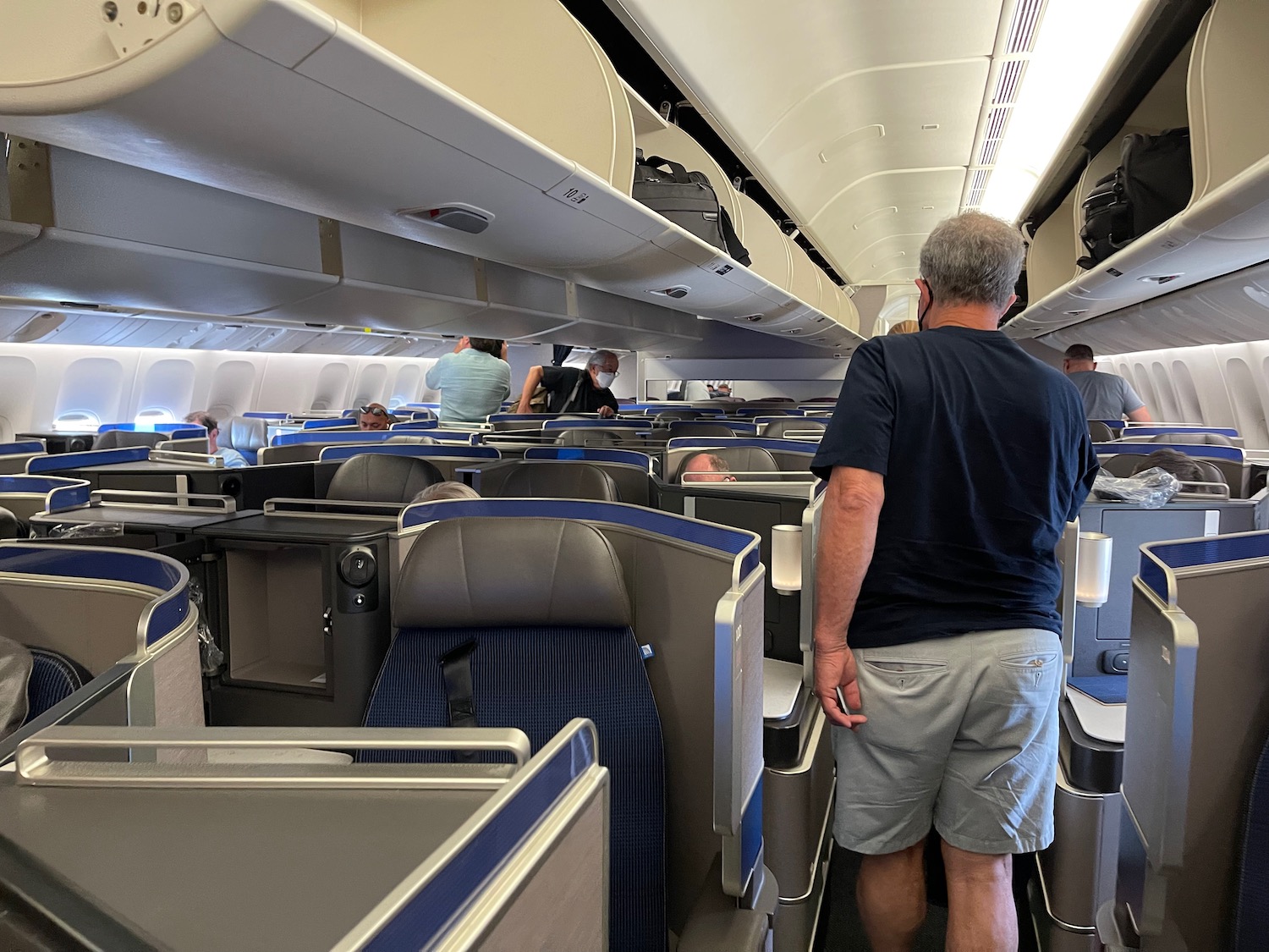 a man standing in an airplane