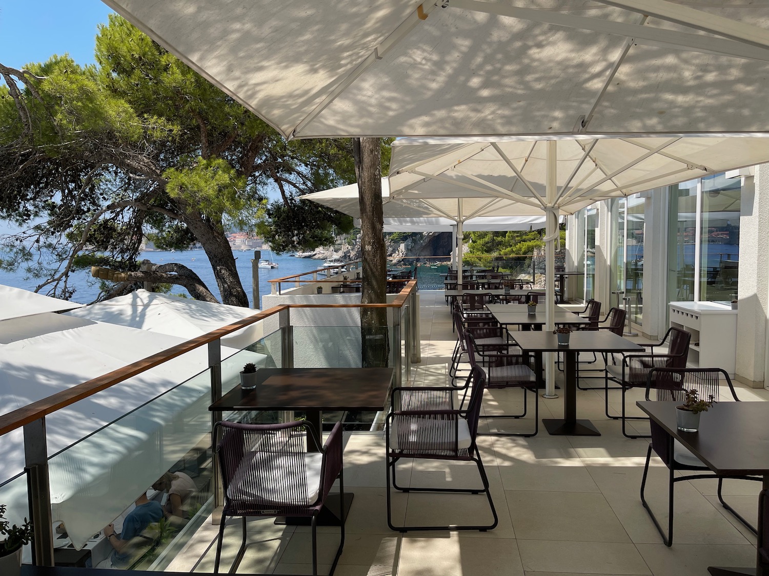 a restaurant with tables and chairs